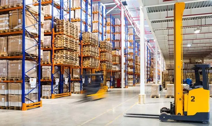 Warehouse interior with forklift