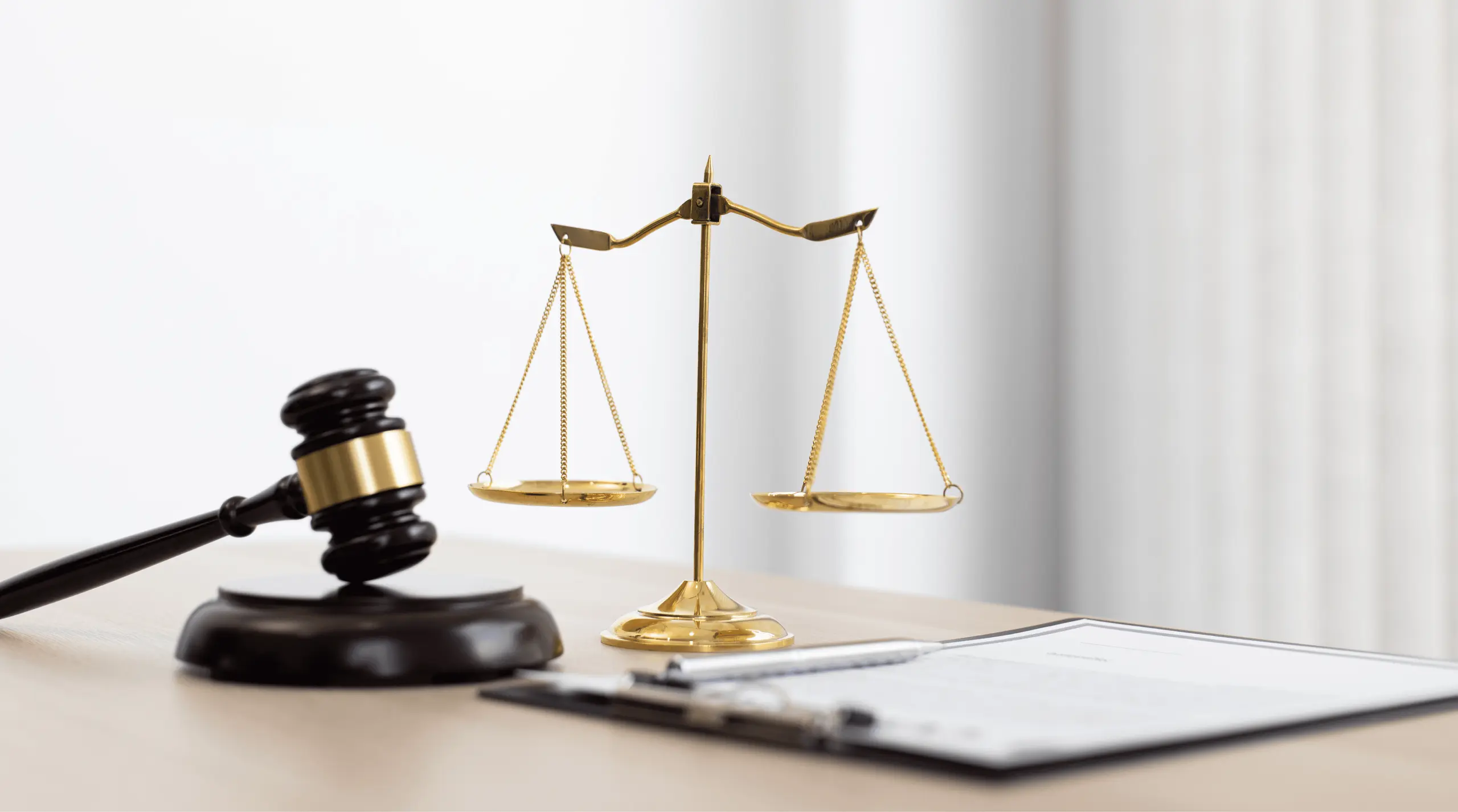 Scales of justice with gavel and document